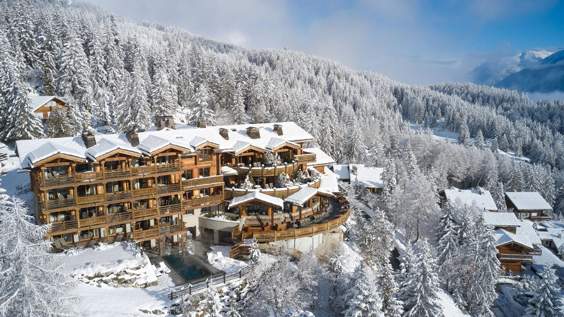 LeCrans 5star luxury hotel nestled in a snowy forest in Crans. 