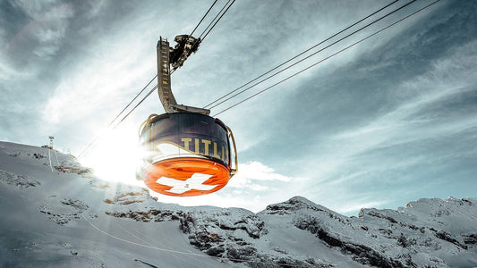 The circular telepherique with a Swiss flag on the bottom takes tourists from Engelberg to Mt. Titlis