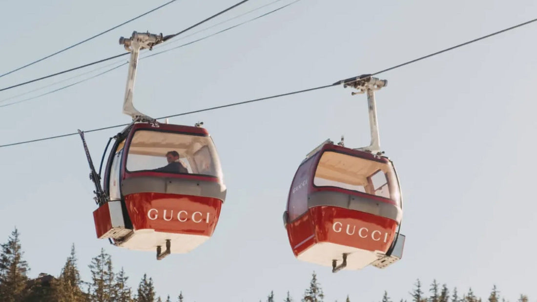Two red gondolas, branded by Gucci, in Courchevel
